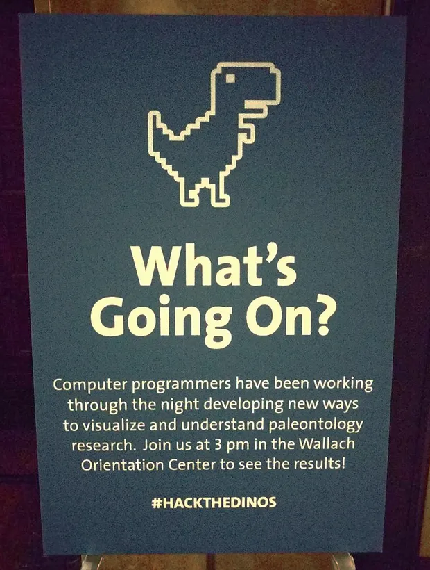 A sign explaining a hackathon at the museum of natural history.
