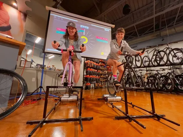 Two people bike racing