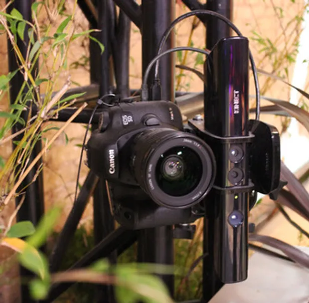 A camera mounted to a piece of steel framing.